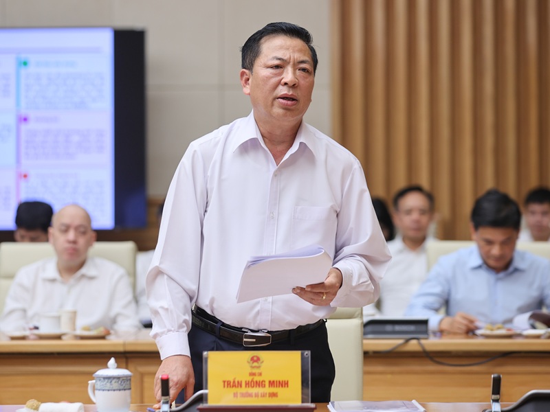 Minister of Construction Trần Hồng Minh reported - Photo: VGP/Nhật Bắc