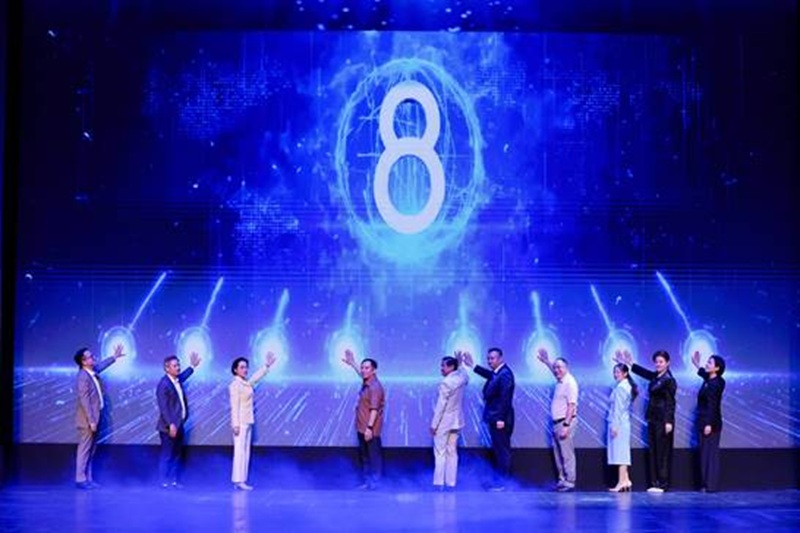 Delegates press the button to launch the digital transformation program during the gala night.